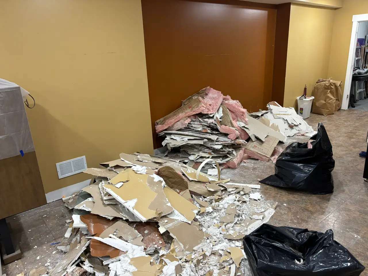 Basement debris pile before an Ann Arbor cleanout