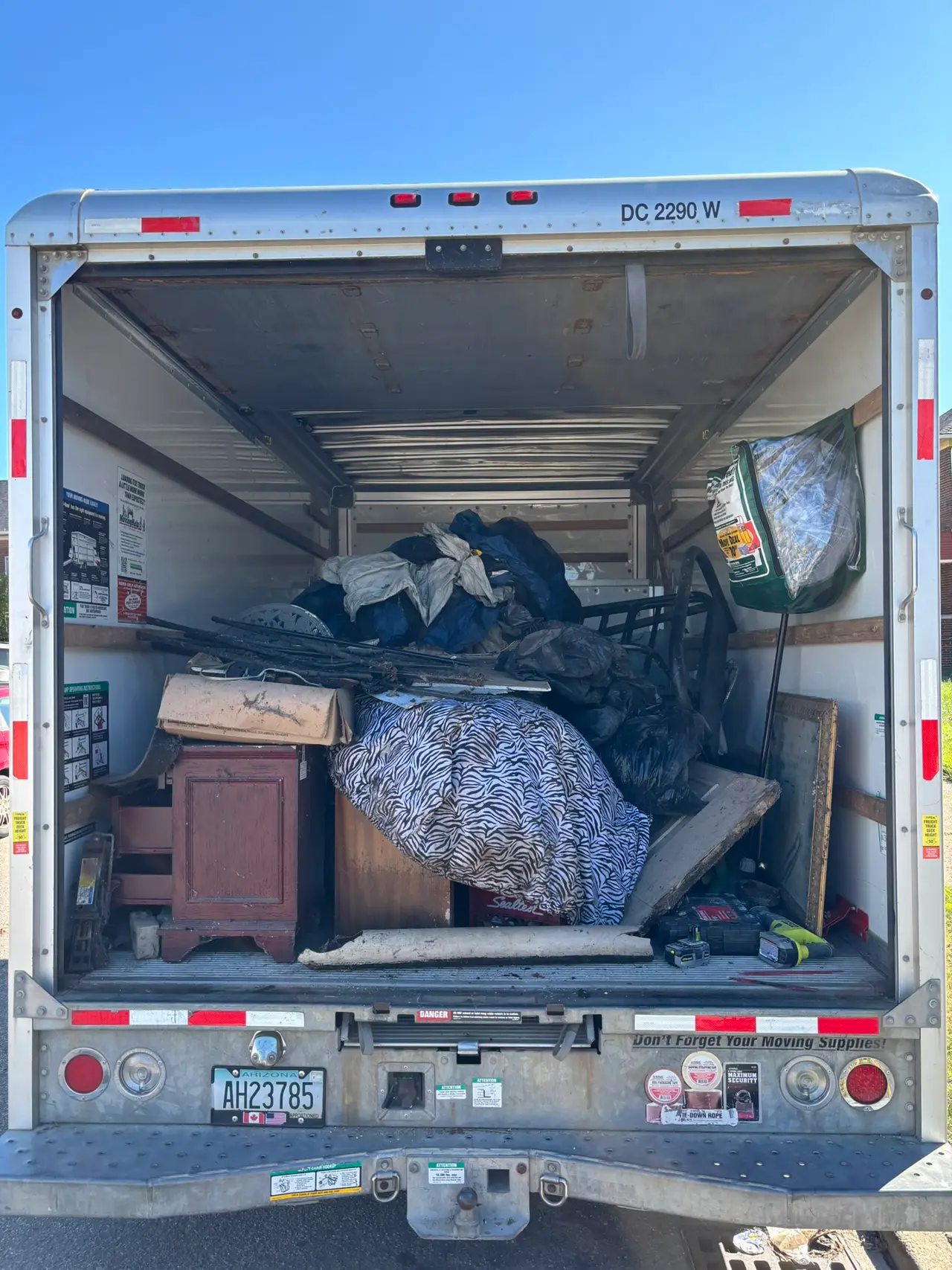 Junkernauts Junk Removal truck loaded after an Ann Arbor basement cleanout