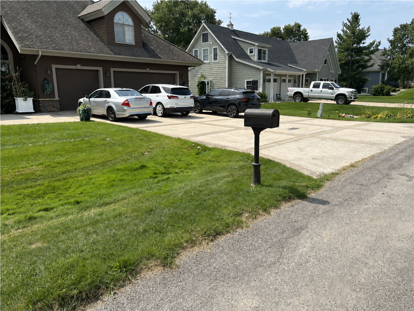 Clear curb and driveway after a Junkernauts Junk Removal curbside pickup