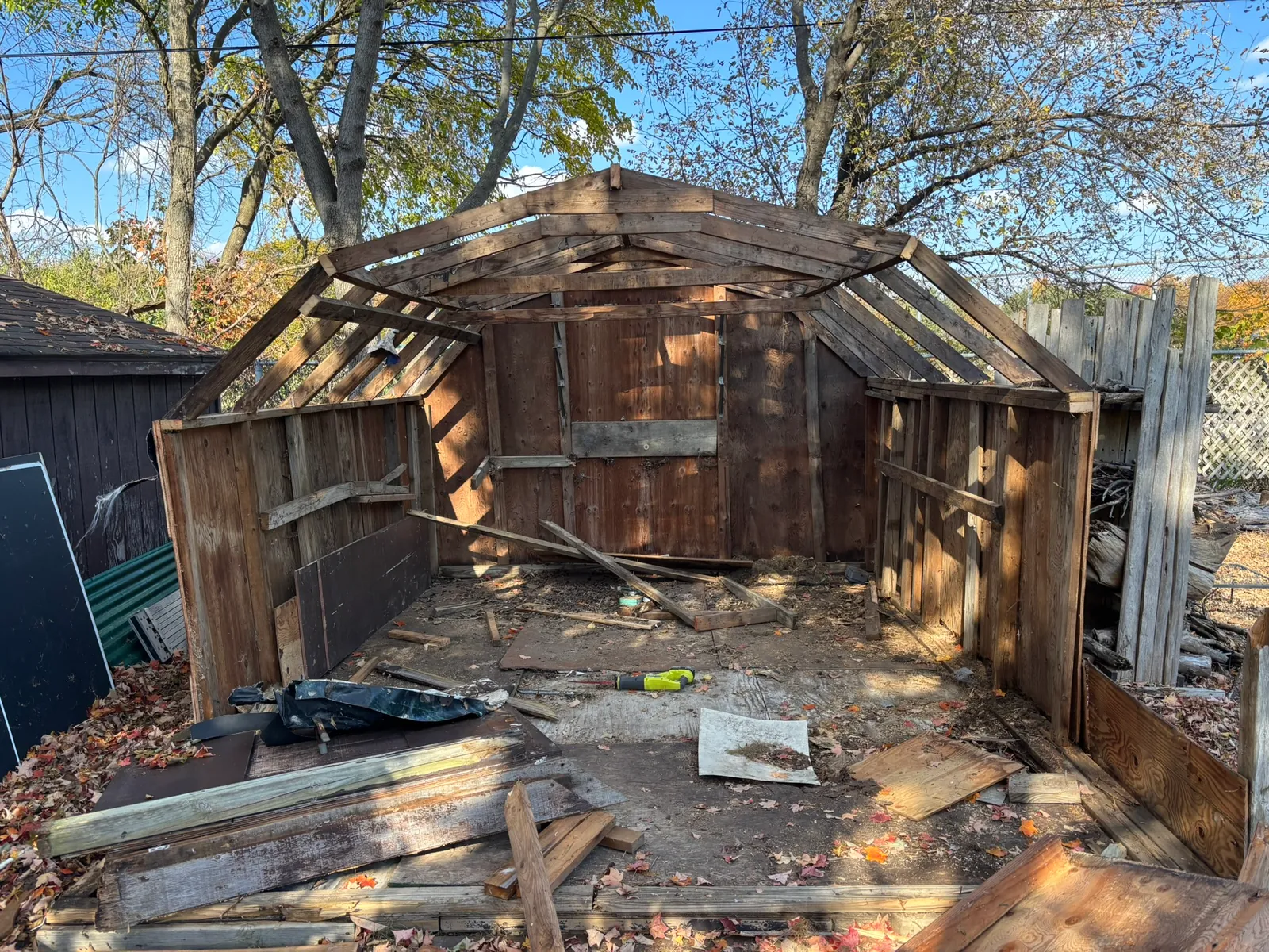 South Lyon shed during demolition with the roof opened up